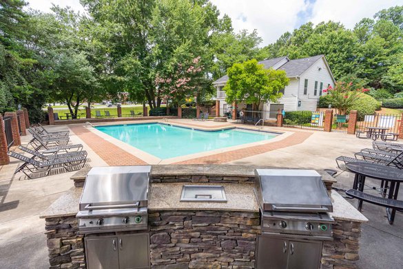 pool at 300 Riverside Apartments located in Austell, GA